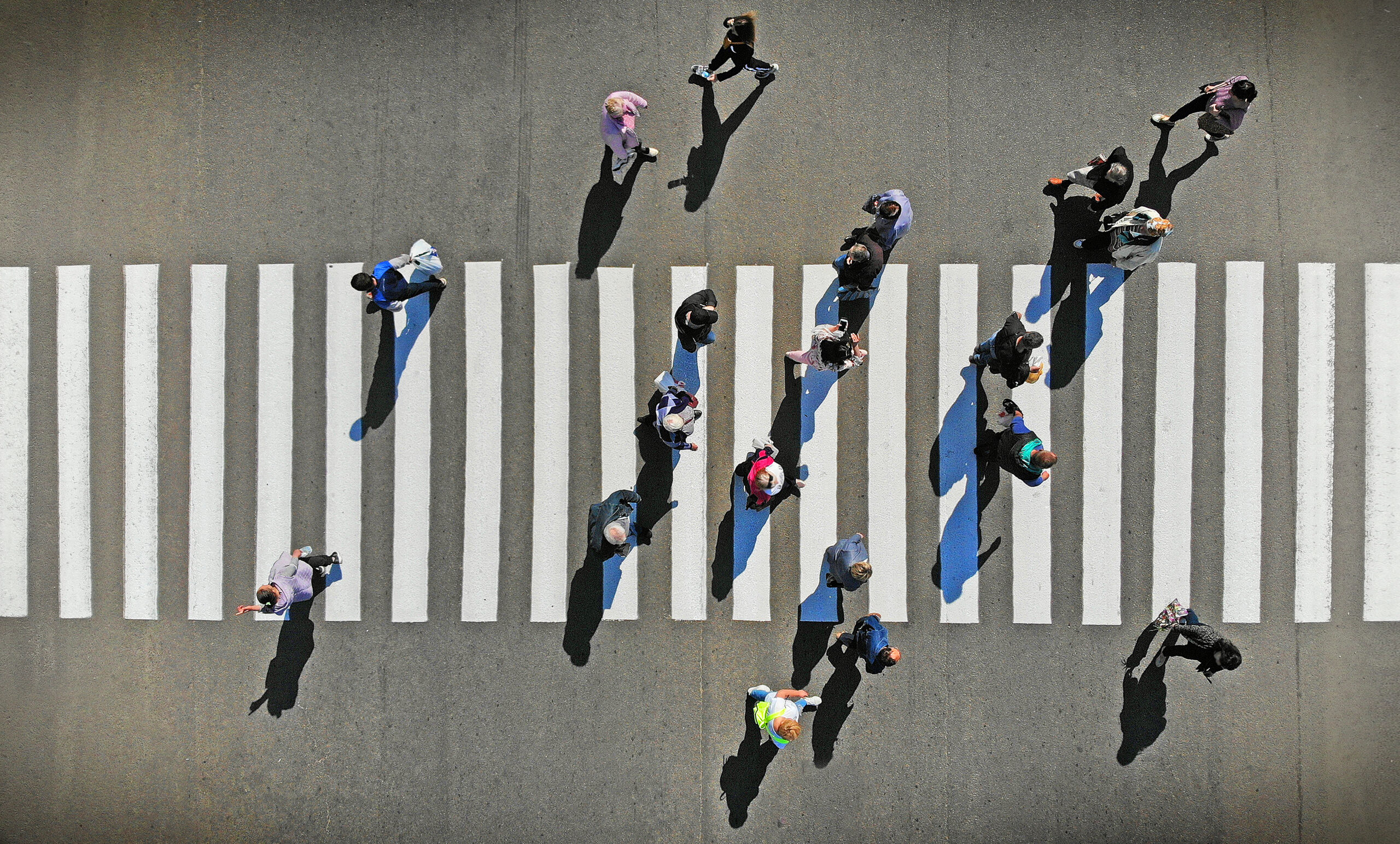 Aerial. Pedestrian crosswalk crossing, top view.